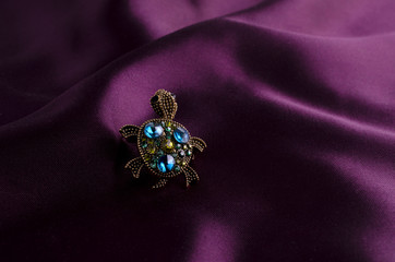 brooch turtle with diamonds on silk