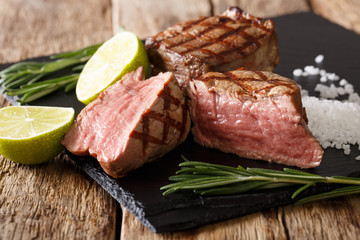 tasty fillet mignon beef steak close-up on board. horizontal
