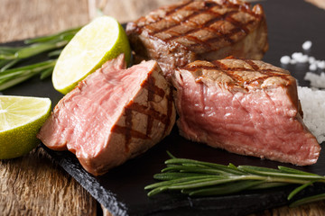 Juicy fillet mignon beef steak close-up on a cutting board. horizontal