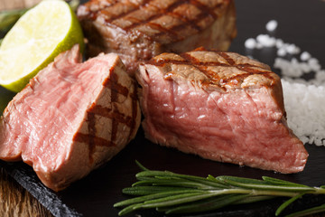 filet mignon steak with lime and rosemary macro. horizontal