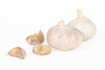 raw garlic isolated on white background with clipping path