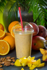 Close up of fresh fruits and vegetables smoothie