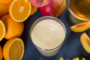 Close up of fresh fruits and vegetables smoothie