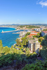 Daylight view to beachline and blue sea of Antibes, France