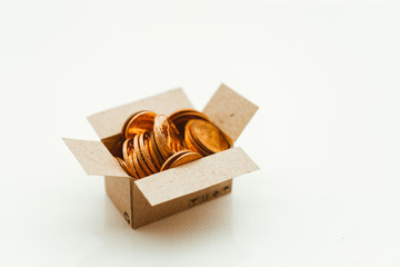 Stack coins in paper box using as business and financial concept - Vintage filter