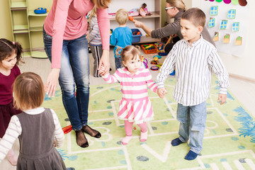 Group of little children dancing 