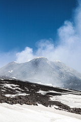 Smoking summit of Etna volcano, Sicily, Italy.