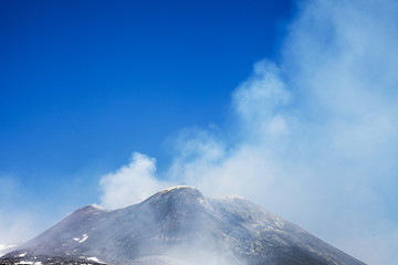 Smoking summit of Etna volcano, Sicily, Italy.