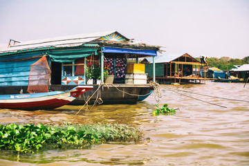 Fototapeta na wymiar Homes on stilts on the floating village of Kampong Phluk, Tonle Sap lake, Siem Reap province, Cambodia