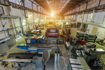 Naklejka premium Metalworking factory. Manufacturing of pipes and equipment parts for air ventilation and condition systems