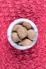 Pile of terminalia bellerica on a cloth background