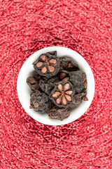 Pile of black kokum on a cloth background