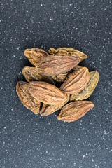 Pile of harde pods isolated on a black background