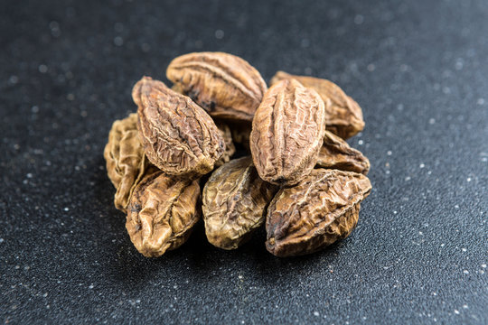 Pile of harde pods isolated on a black background