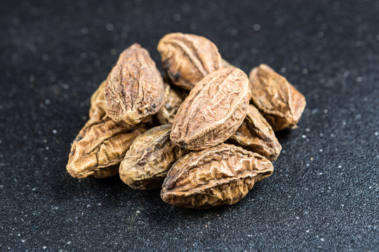 Pile of harde pods isolated on a black background