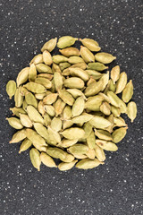 Pile of cardamom isolated on a black background
