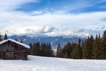 South tirol snow  mountains landscape and wood cabin winter travel