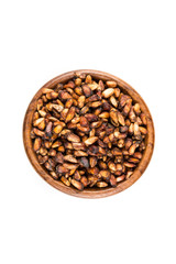 Fototapeta premium Pile of dried pomegranate seeds isolated on a white background