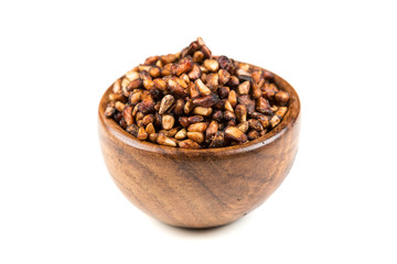 Pile of dried pomegranate seeds isolated on a white background