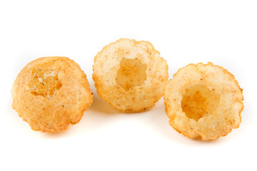 Puffed fried puri isolated on a white background isolated on a white background