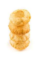 Puffed fried puri isolated on a white background isolated on a white background