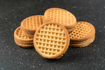 Stacks of cookies isolated on a black background