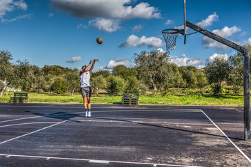 Fototapeta premium Basketball workout in a playground