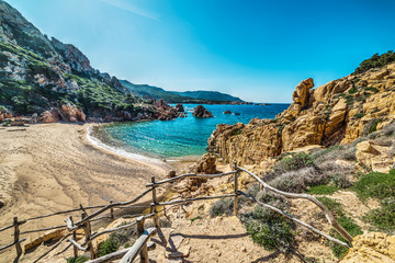 Rocks and sand in Li Cossi beach