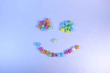 Smiling face from candies