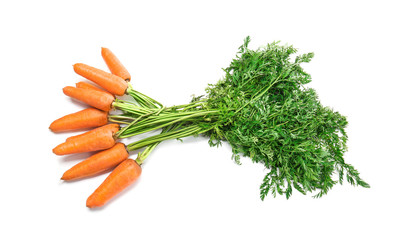 Tasty ripe carrots on white background