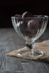 Homemade fresh energy balls with chocolate in glass