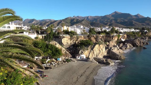 The spanish town Nerja, on the Costa del Sol coast (with Playa Catahonda and the Sierra mountains visible)