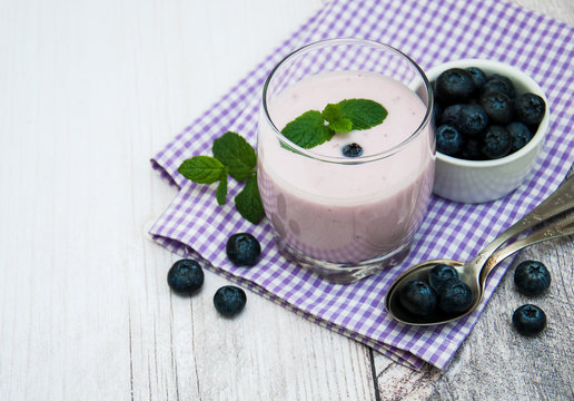 Glass with blueberry yogurt