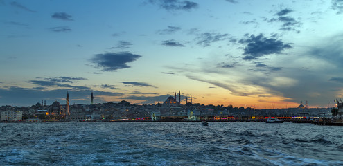 Panorama of Cityscape of Golden horn with ancient street and modern buildings in summer Istanbul is a transcontinental city in Eurasia, straddling the Bosphorus strait
