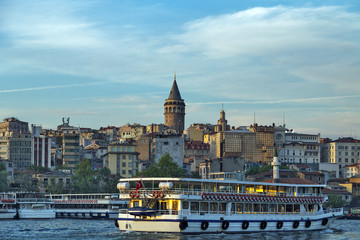 Fototapeta premium Passenger ferry ship on the Gulf Golden Horn, Sea front landscape of Istanbul historical part, Turkey famous city.