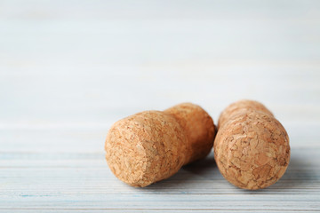 Champagne corks on blue wooden table