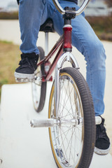 Male bicycle rider on street with phone