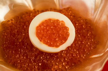 cup of exclusive red caviar, produced with salmon roe