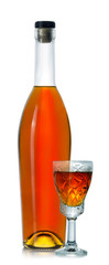 Closed bottle of cognac with a glass