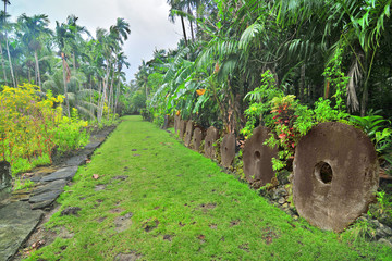 Rai, or stone money on the  forbidden island of Rumung on Yap, Micronesia © robnaw