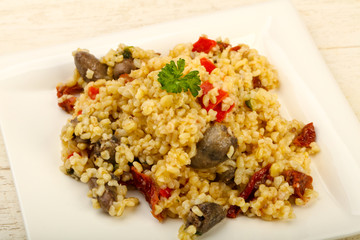 Bulgur with chicken hearts