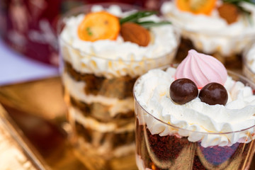 Variety of panacota italian desserts in glass