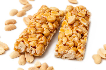 Two gozinaki dessert bars with peanuts