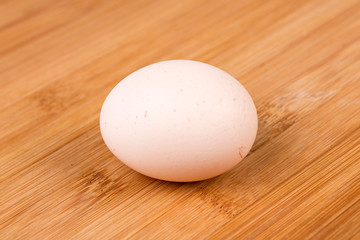 Farm fresh eggs on a wood background
