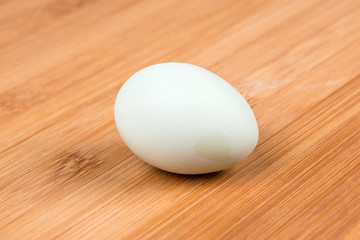 Farm fresh eggs on a wood background
