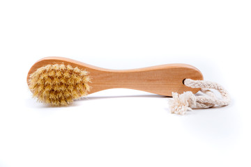 Dry body brush on a white background