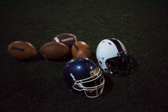 american football and helmets