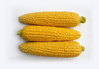 A flask of fresh, peeled corn, on a white background