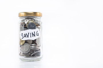 Coins in a glass jar with note written 