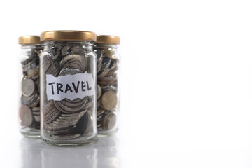 coins in a glass jar labeled 